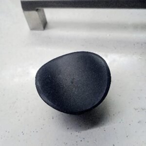 Round metallic cabinet knob with a polished copper finish, designed for modern and vintage-style furniture.