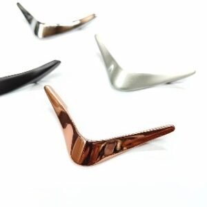 modern V-shaped cabinet handles in multiple finishes, including rose gold, silver, black, and chrome, displayed on a white background.