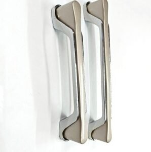 Pair of modern metallic door handles with a silver chrome body and matte finish ends, placed side-by-side on a white background.