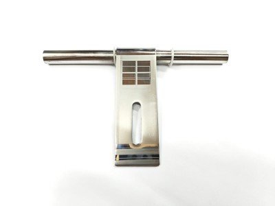 Image (60) Polished stainless steel T-bar latch with an elongated mounting slot and decorative etched square grid pattern on the front, placed on a white background.