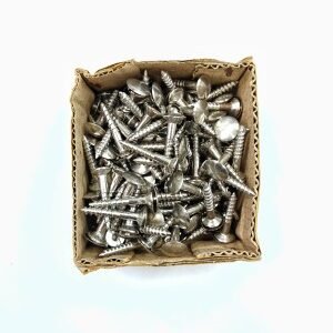 A small cardboard box filled with shiny silver metal screws.