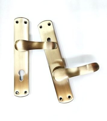 Image (77) gold-finish lever door handles with rectangular backplates and keyholes, designed for elegant interior and bathroom doors, displayed on a white background