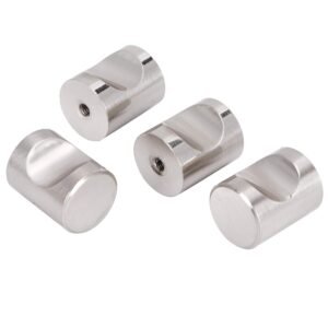 Set of small cylindrical stainless steel brackets with a semi-circular groove, placed on a white background.