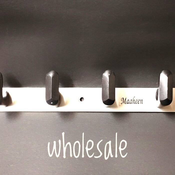 metallic modern look black pin steel plate wall-mounted cloth hanger with 6 hooks for hanging clothes, hats, and accessories.