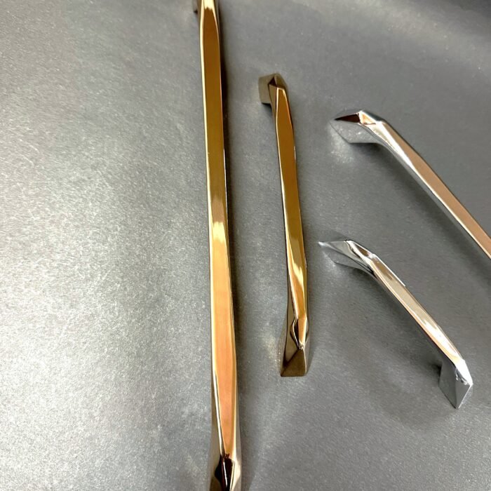 golden chrome finish modern metal handles for doors, cabinets, and wardrobes.
