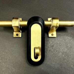 "Premium brass aldrop door latch with golden finish and black base, designed for secure locking on wooden and metal doors."