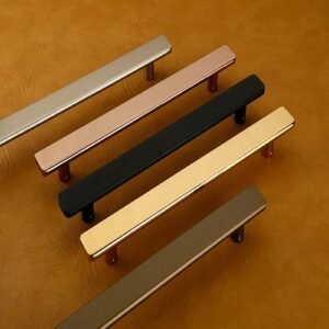 pull handles in matte black, satin brushed stainless steel, and polished copper finishes, designed for modern furniture and doors