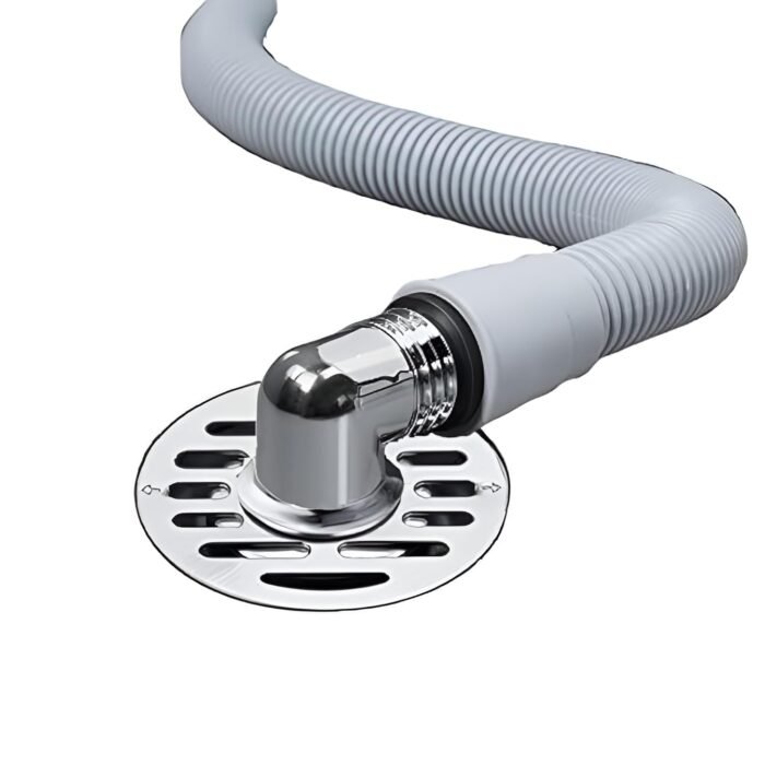 Flexible corrugated drain hose connected to chrome elbow fitting and circular metal floor drain cover for efficient appliance wastewater disposal.