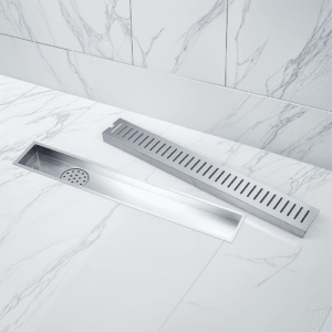 Sleek linear stainless steel drain cover with square grid holes on a white background.